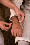 Floral Emerald Silver Rakhi